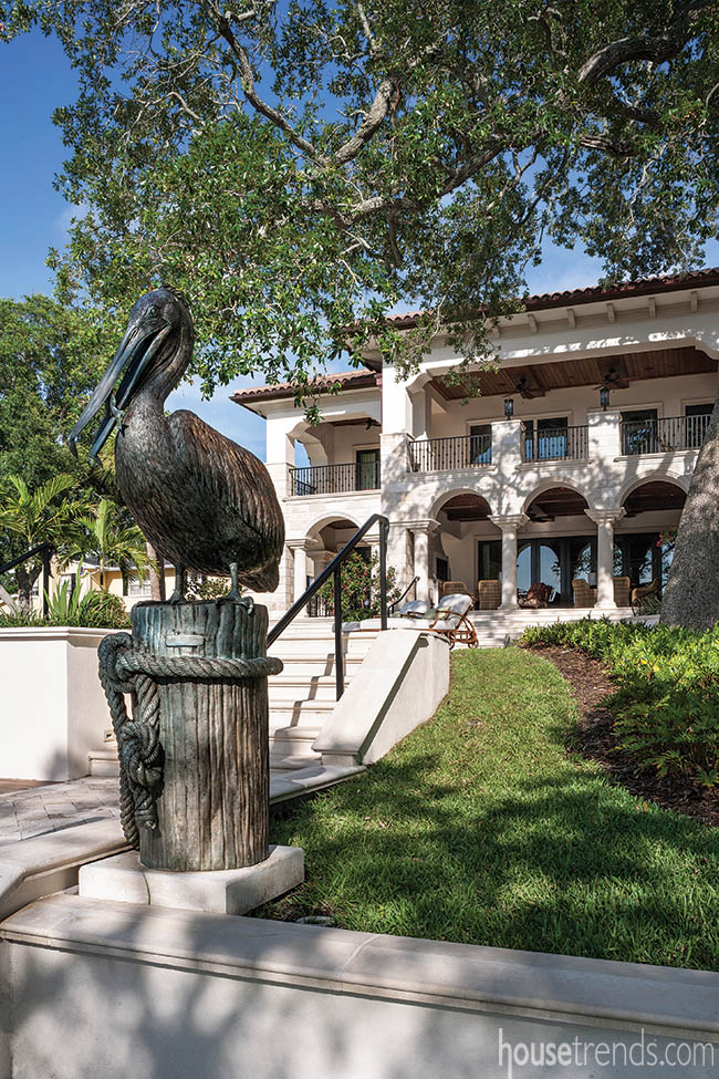 Pelican statue adds personality to a back yard