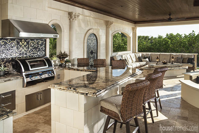Pool pavilion houses an outdoor kitchen