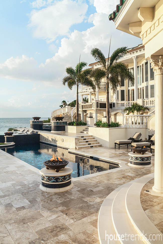 Palm trees balance out a back yard