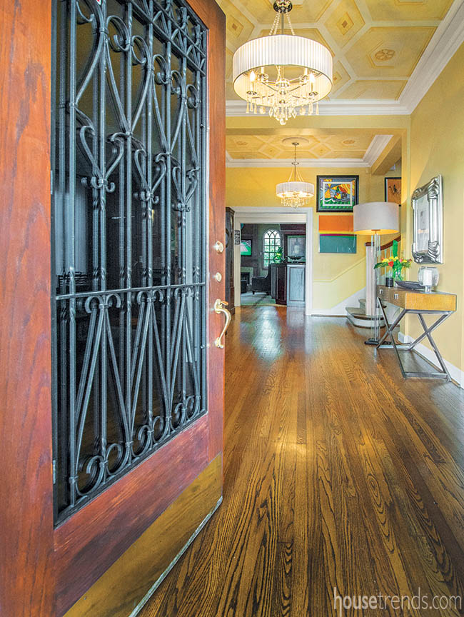 Front entry boasts iron grillwork