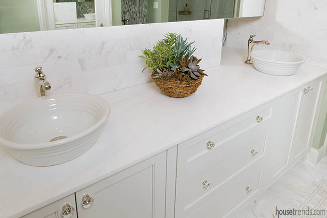 Vessel sink bowls top off a double vanity