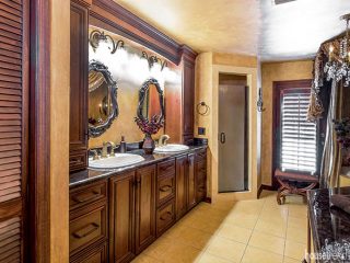 Mirrors hang over a double vanity