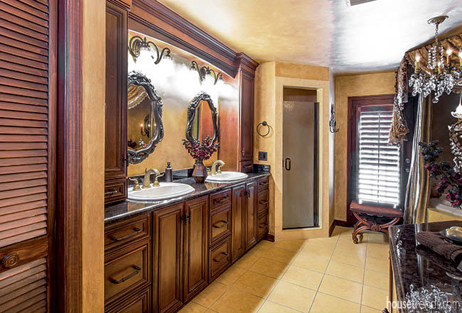 Mirrors hang over a double vanity