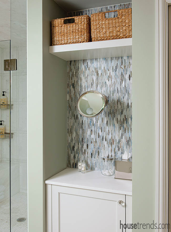 Glass mosaic tile pops in a master bathroom