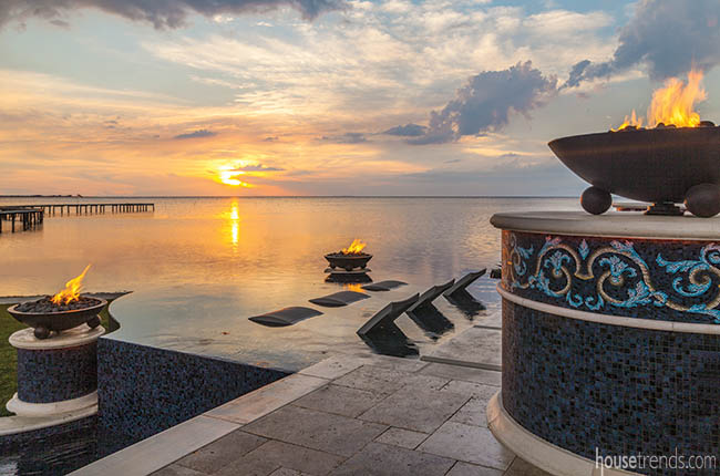 Infinity edge pool blends with a water view