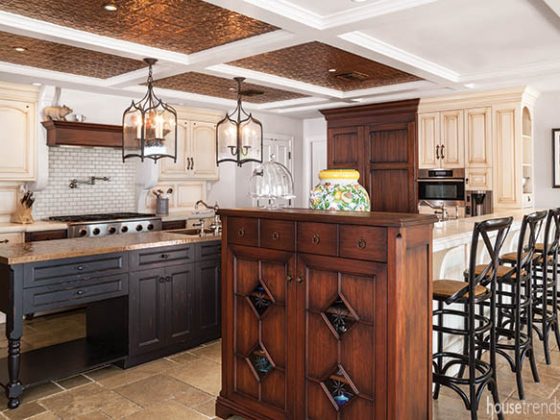 Armoire adds an elegant touch to a kitchen island