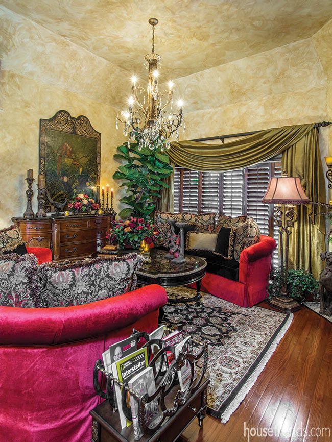 Red sofas add color to a living room