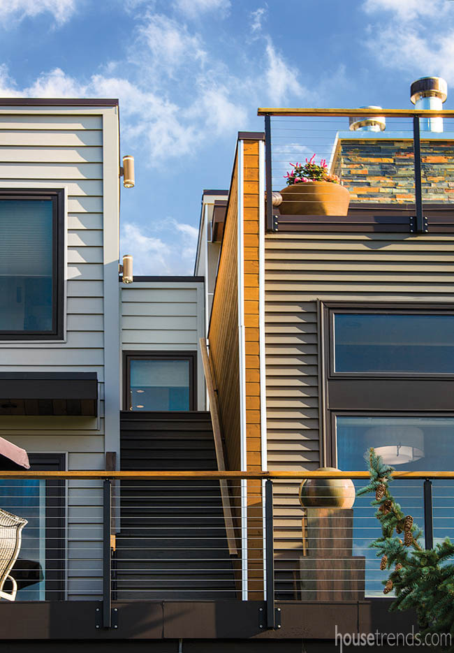 Outdoor stairwell creates path from upper deck to patio
