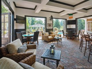 Pool house connects directly with nearby pool and patio