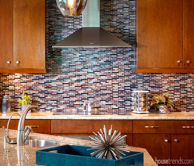 Tile backsplash complements granite countertops