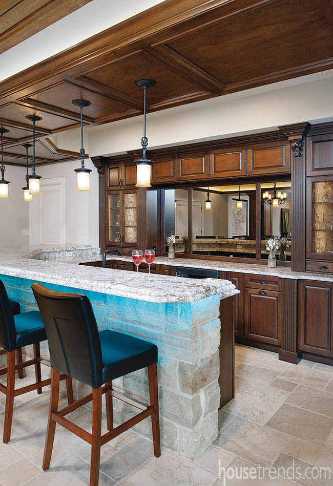 Stone connects basment bar to nearby fireplace