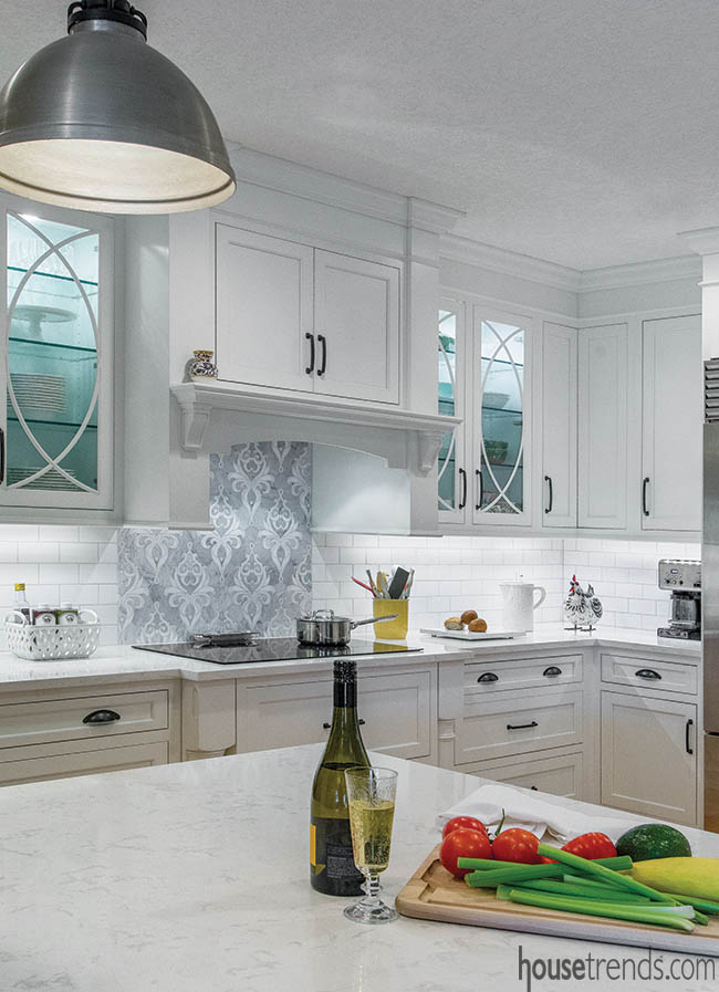 Mosaic tile backsplash creates focal point