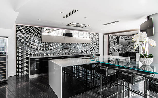 Kitchen design features a tile mosaic