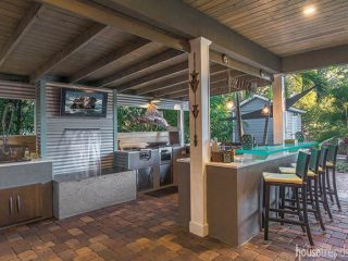 Water feature dresses up an outdoor kitchen