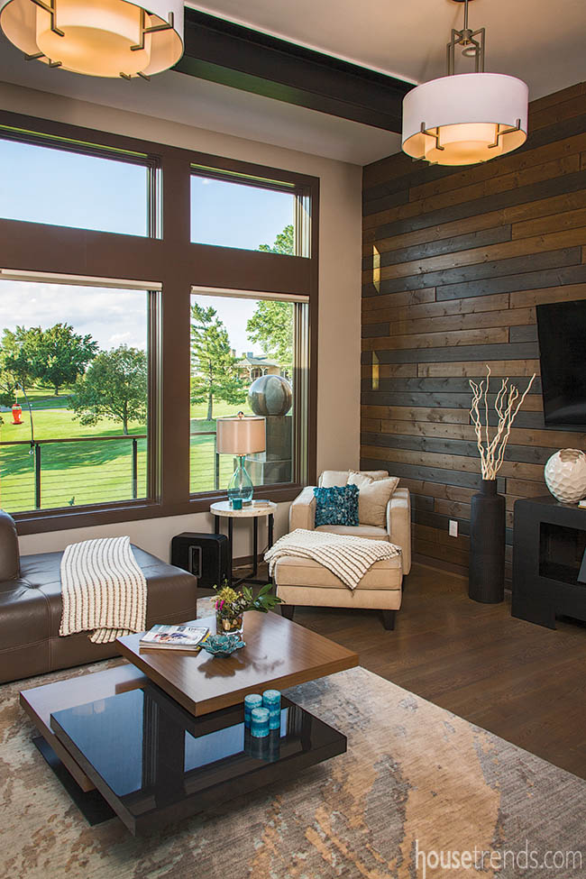 Living room windows show off a golf course