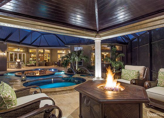 Pergola overlooks pool and hot tub