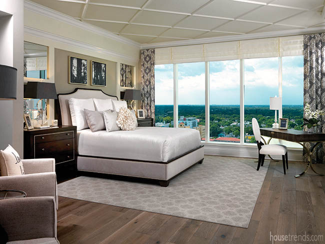 Master bedroom boasts wide plank flooring