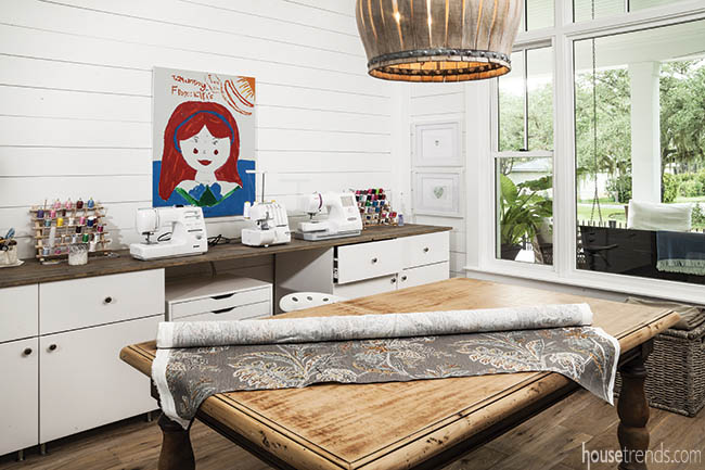 Artwork colors up a sewing room design
