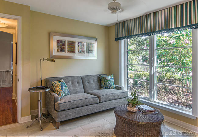 Sitting area overlooks a back yard