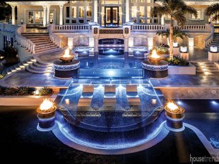 Fire bowls surround swimming pools