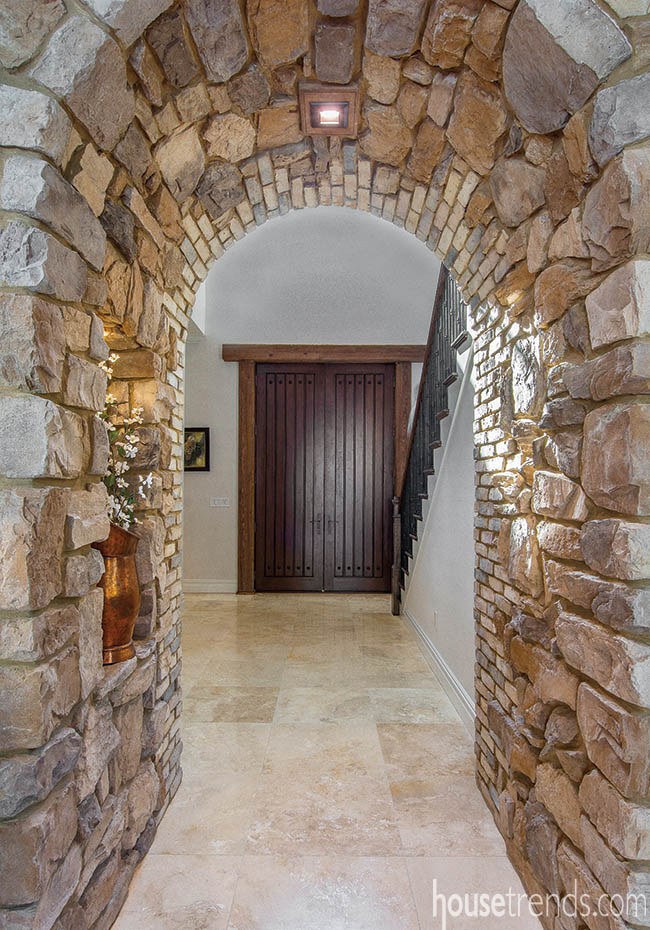 Wood and stone add texture to a foyer design
