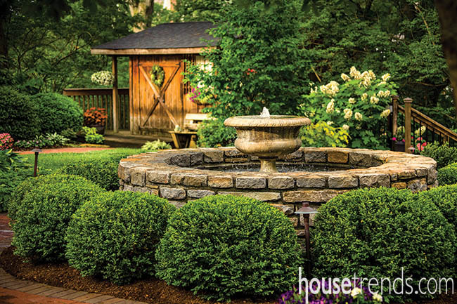 Shed adds a rustic touch to a landscape design