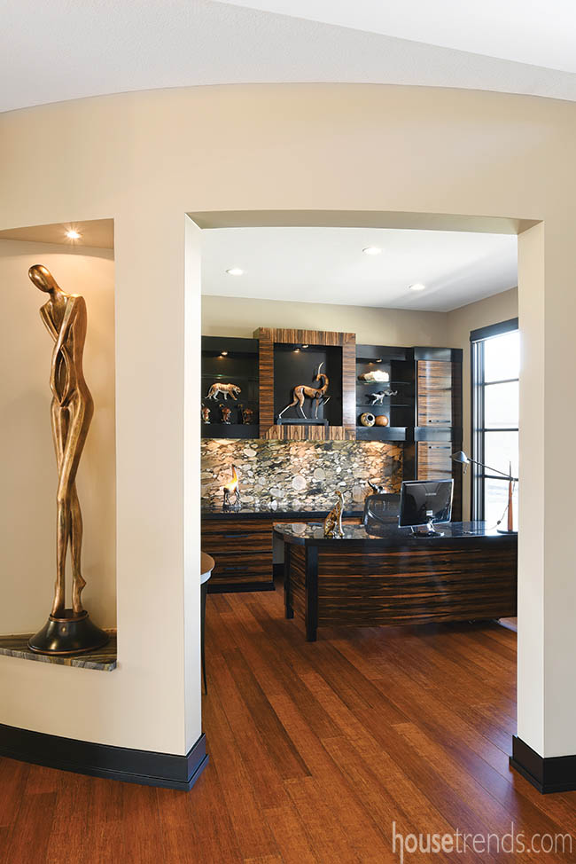 Wood sculpture guards a home office