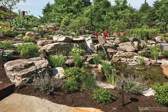 Fire pit tucked into a landscape design