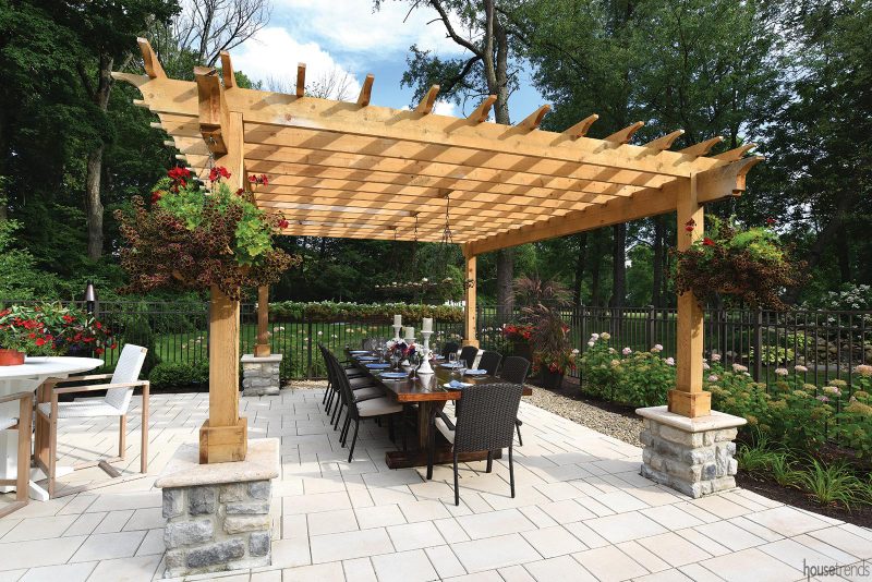 Pergola shelters an outdoor dining area