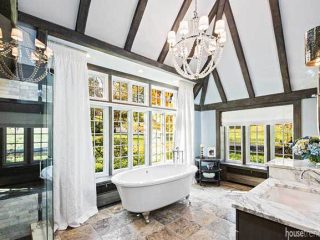 Windows lend natural light to a master bath