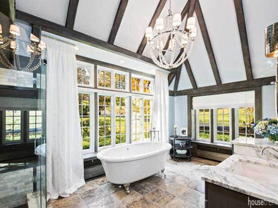 Windows lend natural light to a master bath