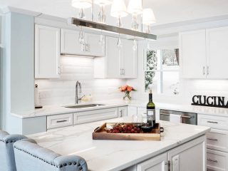 Smooth quartz runs through a remodeled kitchen