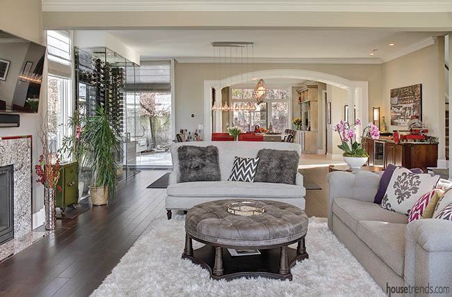 White area rug anchors a living room