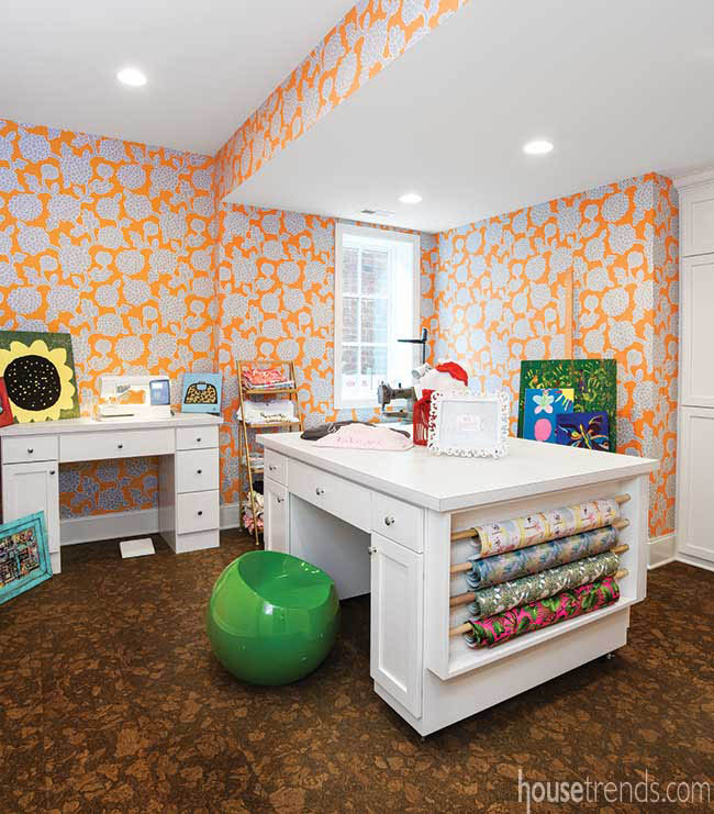 Orange walls pop in a craft room
