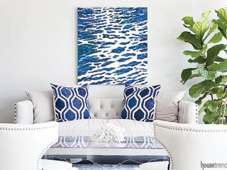 Navy accents pop in a white living room