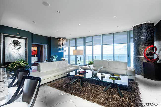 White couches anchor a living room