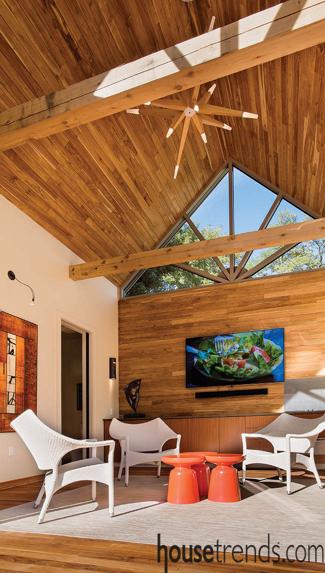 Teak planks take over a pool house design