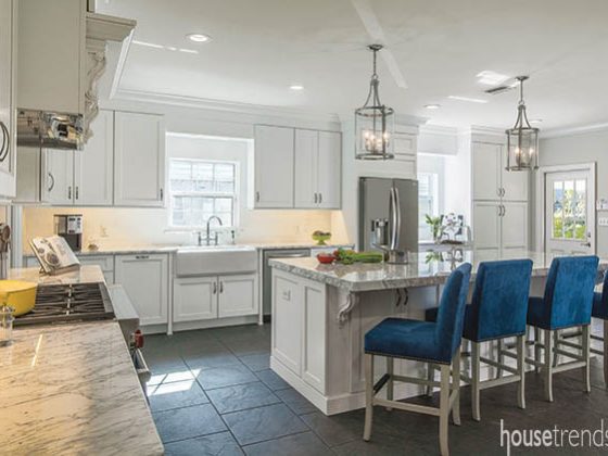 White kitchen cabinets offer ample storage
