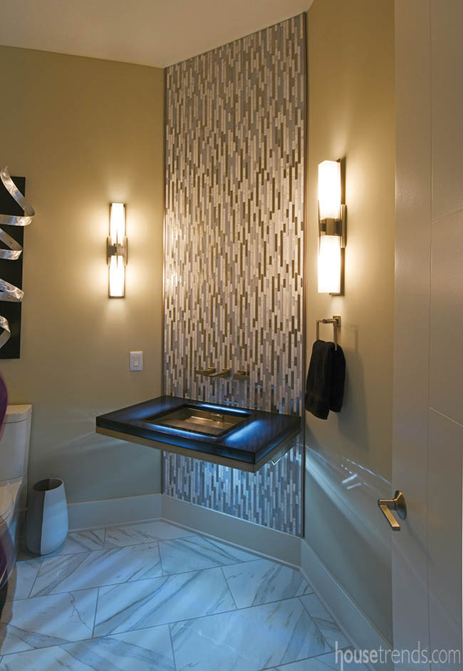 Floating vanity lights up a powder room