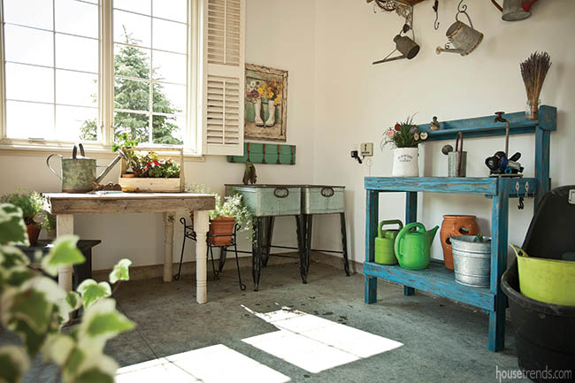 Potting shed displays collection of antique watering cans