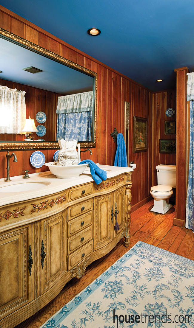 Wood paneling adds charm to a master bathroom