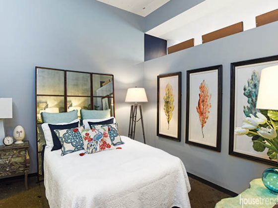 Mirror reflects back a bedroom