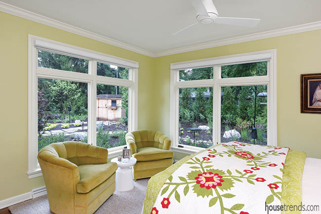 Windows connect a master bedroom to nature