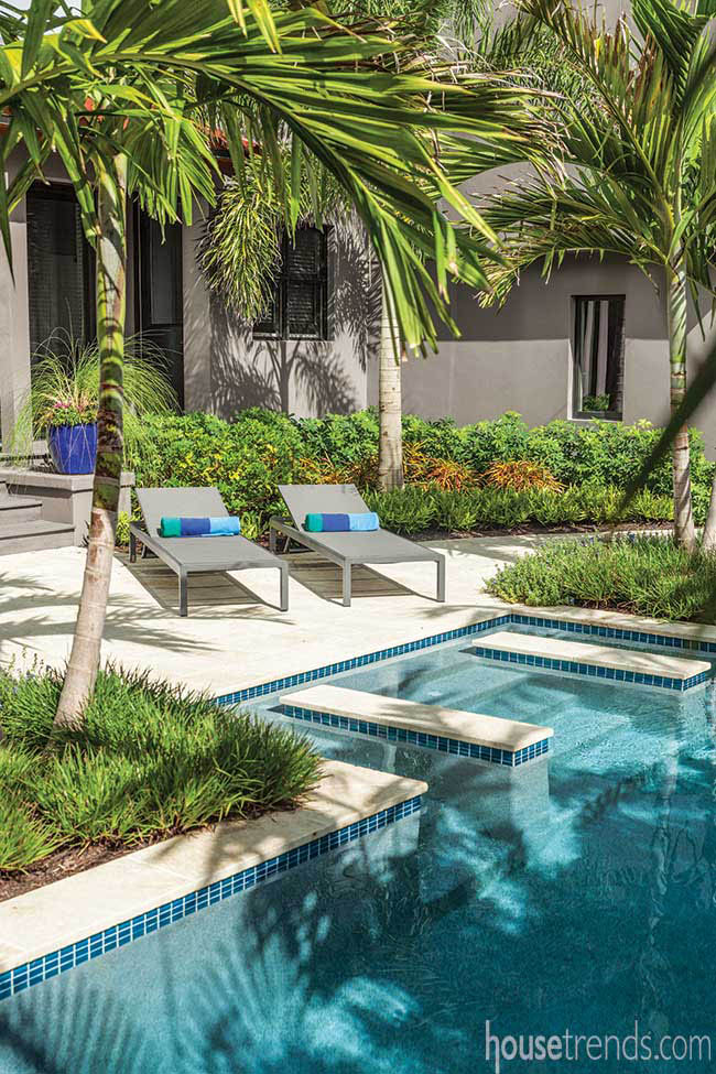 Pillars add interest to a back yard pool