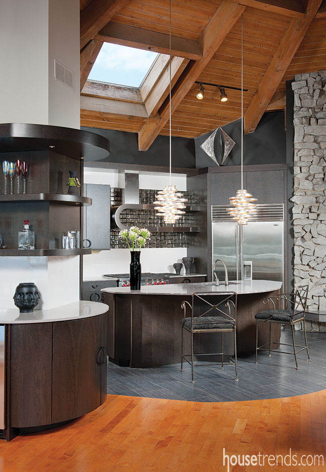Pendant lights dazzle over a kitchen island