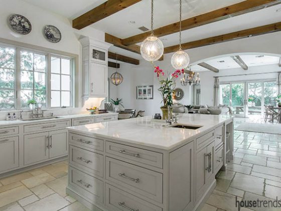 Island cabinetry connects a kitchen design