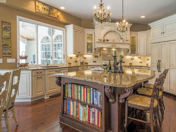 Kitchen island provides counter space and shelving