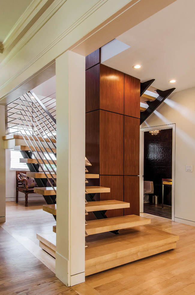 Modern staircase rebrands a home's traditional style