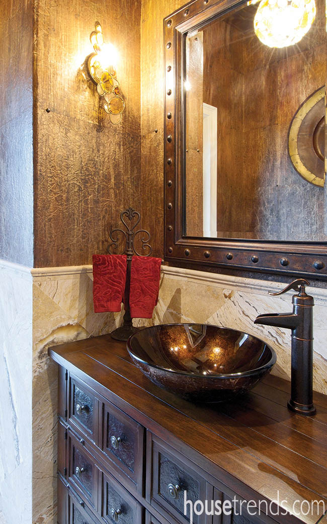 Vessel bowl sink adds drama to a powder room design
