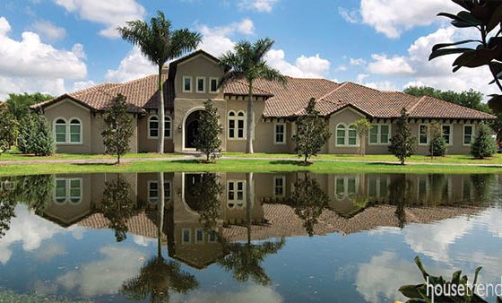 Tuscan home design sits on the water